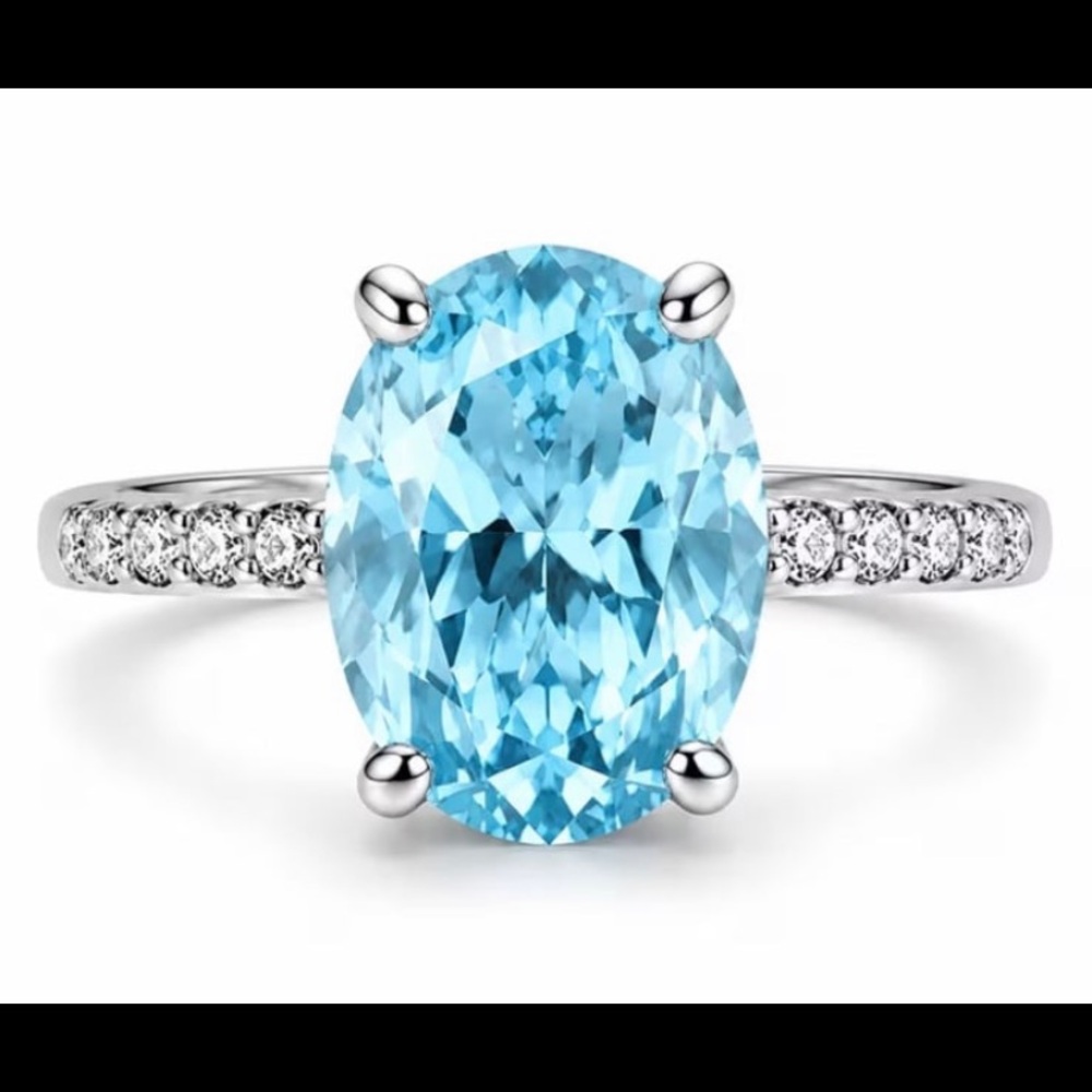 Sterling Silver Oval Blue Topaz Ring with Pavé Accents